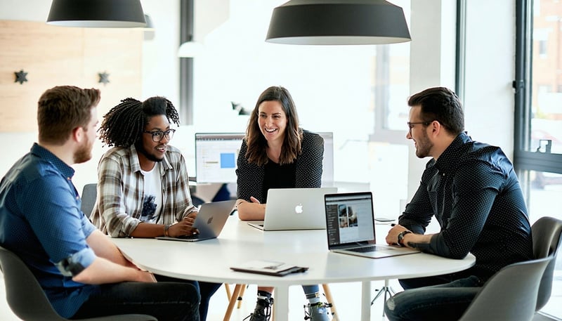 SixStep Solutions team collaborating on a digital project